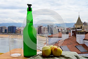 Traditional natural Asturian cider made fromÂ fermented apples in wooden barrels should be poured from great height for air